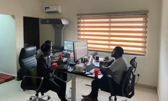 Fu’ad Lawal, the Archivi.ng founder (right), joins Boyega Adediran and Grace Abraham in the Lagos office.