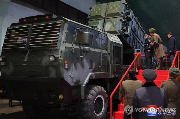 North Korean leader Kim Jong-un (L, rear) inspects a munitions factory, in this undated photo released by the North's official Korean Central News Agency (KCNA) on Jan. 10, 2024. During his visits to major munitions factories in unspecified locations on Jan. 8-9, Kim called South Korea the country's 
