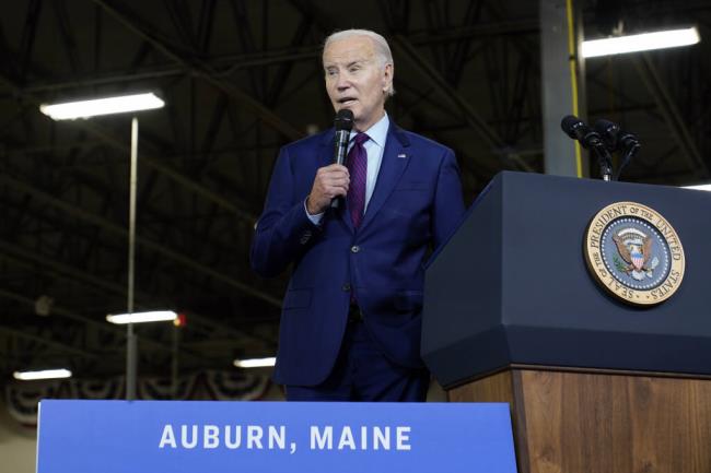 President Joe Biden speaks at Auburn Manufacturing Inc., in Auburn, Maine, Friday, July 28, 2023, before he signs an executive order to encourage companies to manufacture new inventions in the United States. (AP Photo/Susan Walsh)