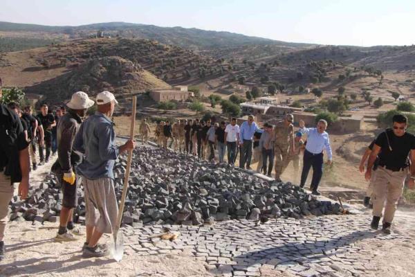 Families start to return after village cleared of terror