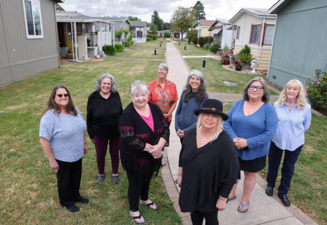 Sheri Feinstein, left, Deborah Roberts, Kay Poland, Sue Sullivan, Laura Bennett, Jodi Johnson, Shawn Powell, and Betty Hautzenrader are representatives of multiple Petaluma mobile home parks in Petaluma campaigning the city to take up the issue of rent control. Photo taken at the Youngstown Senior Mobile Home Park in Petaluma, Tuesday, June 6, 2023.  (Christopher Chung / The Press Democrat file)