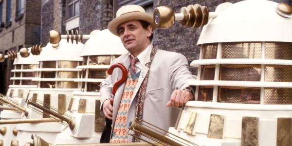 Sylvester McCoy posing with the Daleks in Doctor Who
