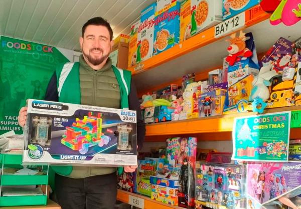 Paul Doherty at Foodstock, where the west Belfast community had stepped in to provide hundreds of toys for children across the community who might not have had a Christmas.
