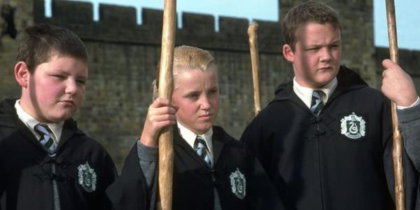 Draco with Crabbe and Goyle on either side of him in Harry Potter and the Philosopher's Stone.