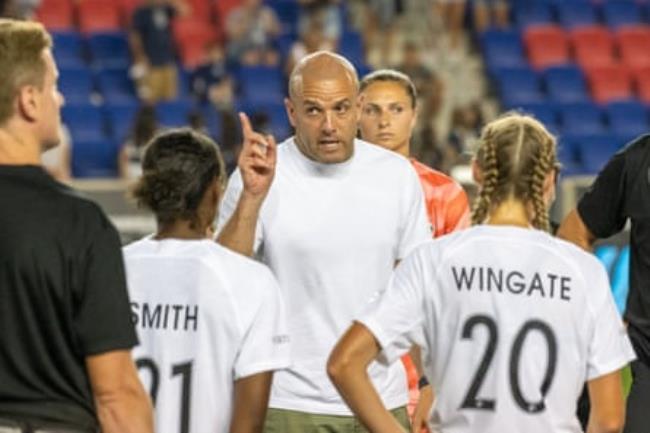 North Carolina manager Sean Nahas, center, has kept the Courage on course despite the club’s half-dozen World Cup absences.
