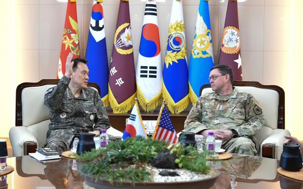Joint Chiefs of Staff (JCS) Chairman Adm. Kim Myung-soo (L) holds a meeting with Gen. B. Chance Saltzman, the chief of space operations at the U.S. Space Force, at Kim's office in Seoul on May 7, 2024, in this photo provided by the JCS. (PHOTO NOT FOR SALE) (Yonhap)