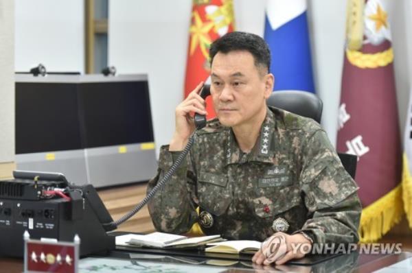Joint Chiefs of Staff Chairman Adm. Kim Myung-soo talks on the phone, in this undated file photo provided by his office. (PHOTO NOT FOR SALE) (Yonhap) 