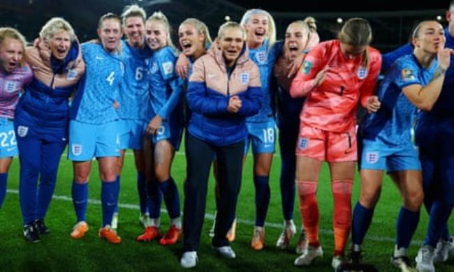 Sarina Wiegman gets the on-pitch celebrations started.