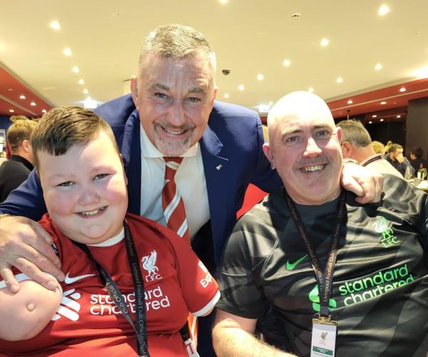 A thrilled Daire and his dad Kenny with Liverpool legend John Aldridge