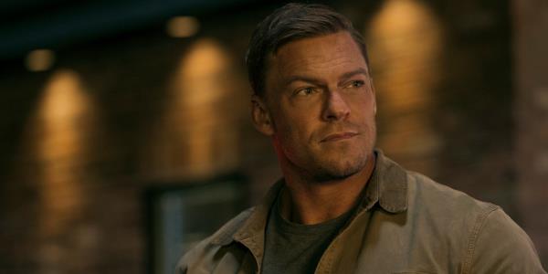 jack reacher stares into the distance in reacher season 2