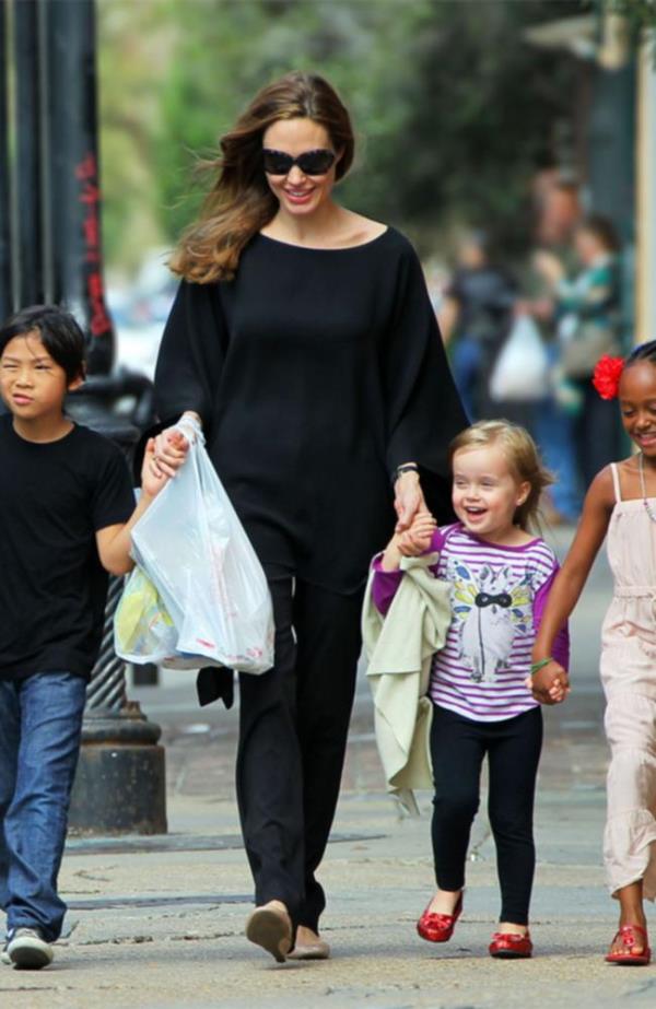 Brad Pitt, Angelina Jolie, and their six children Maddox,  Pax, Zahara, Shiloh, Knox, and Vivienne go for a walk in their neighborhood in New Orleans, LA, USA on March 20, 2011.  Photo by Elizabeth Pantaleo/ABACAUSA.COM  *** WAN o<em></em>nLINE OUT ***