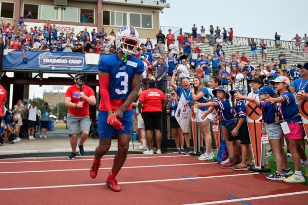 FILE - Buffalo Bills safety Damar Hamlin (3) runs to the field before practice at the NFL football team's training camp in Pittsford, New York last month. Hamlin is preparing for the next step to resume his career by suiting up in Buffalo's preseason-opening game against the Indianapolis Colts on Saturday.